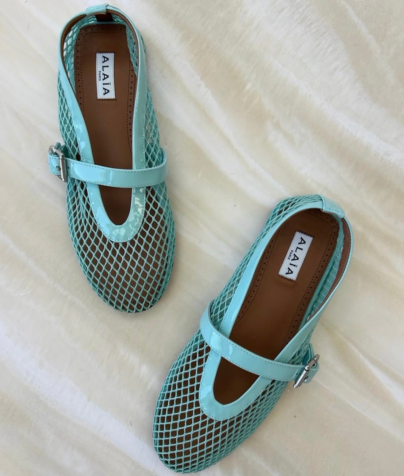 ALAÏ BLUE FISHNET BALLET FLATS